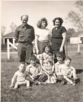 DAD, MOM AND CHILDREN IN&nbsp;YARD