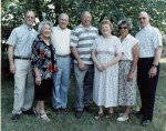 Mom and siblings outdoors&nbsp;1997